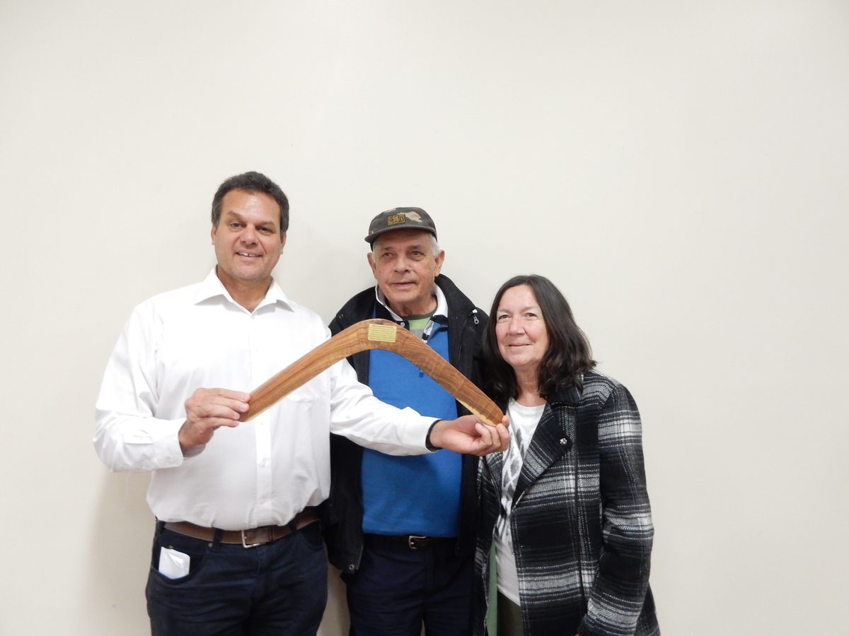 Uncle Joe Skeen presenting David Saylor with a boomerang at the Widi #2 and Barada Barna determination